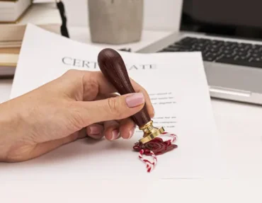 Translator reviewing certified legal document in Dubai
