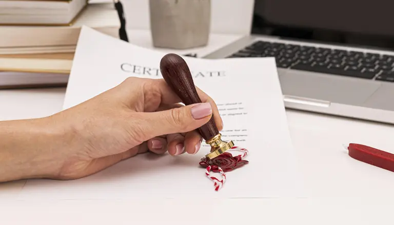 Translator reviewing certified legal document in Dubai